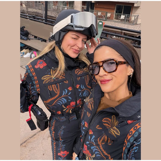 Tuta da neve donna con cappuccio, bianca o fantasia