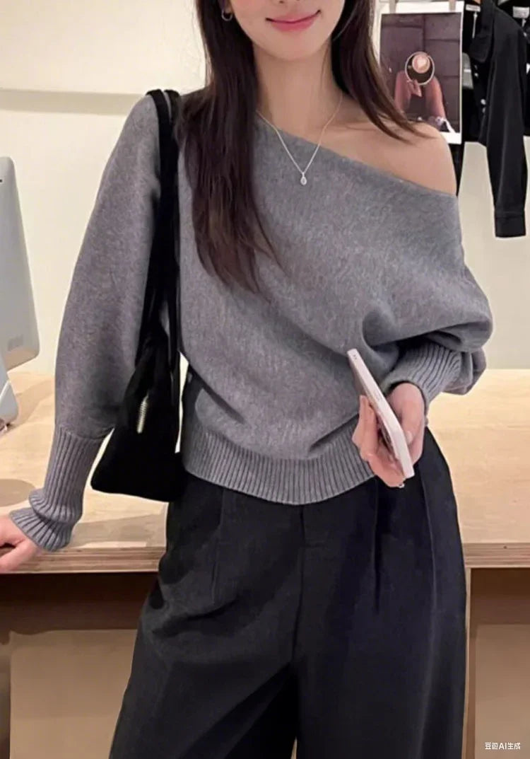 Maglione donna con spalle scoperte e maniche ampie