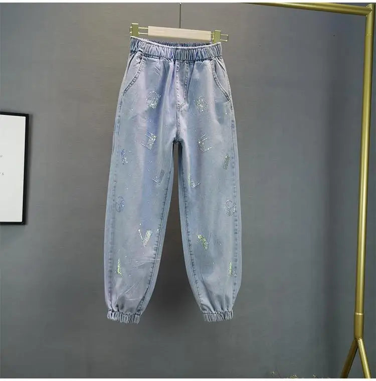 Jeans Donna Vita Alta con Gamba Larga e Vita Elasticizzata –Estate 2025