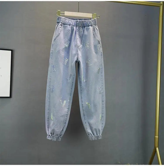 Jeans Donna Vita Alta con Gamba Larga e Vita Elasticizzata –Estate 2025