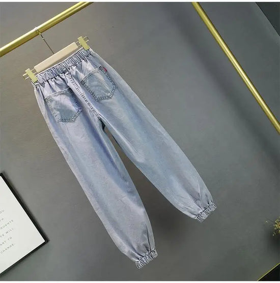 Jeans Donna Vita Alta con Gamba Larga e Vita Elasticizzata –Estate 2025