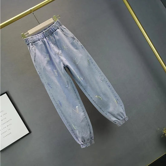 Jeans Donna Vita Alta con Gamba Larga e Vita Elasticizzata –Estate 2025