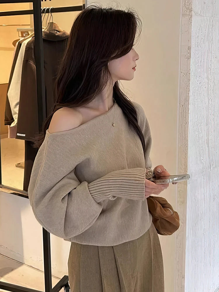 Maglione donna con spalle scoperte e maniche ampie