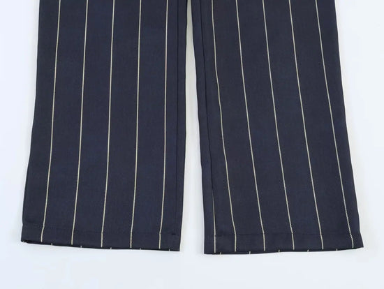 Completo donna a righe con giacca corta e pantaloni dritti