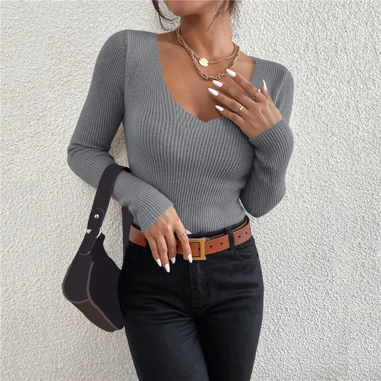 Maglia donna a costine con scollo a V e maniche lunghe