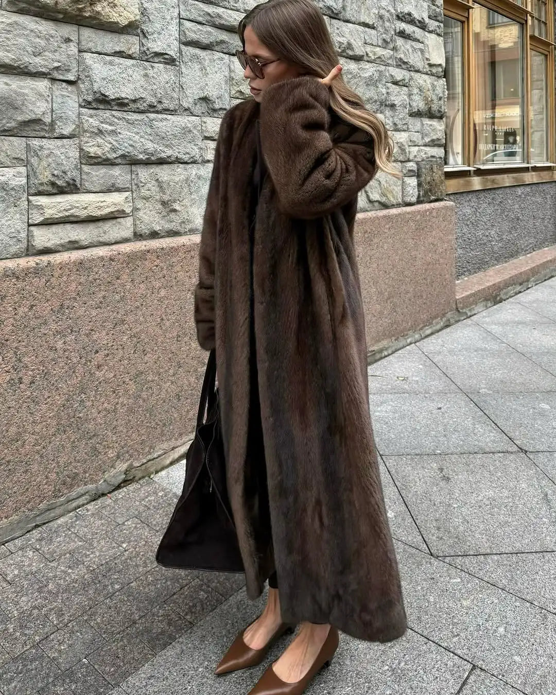 Cappotto donna in pelliccia sintetica dal taglio ampio