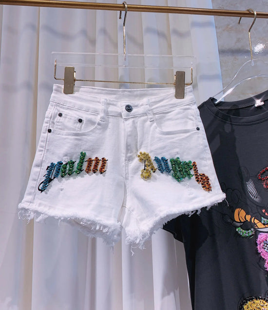 Shorts donna vita alta elasticizzati con strass – denim bianco slim fit per l’estate 2025