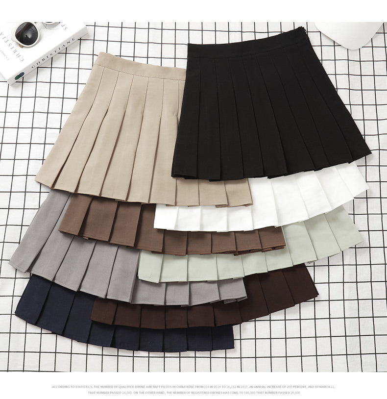 Gonna plissettata cortissima a vita alta – stile uniforme