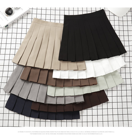 Gonna plissettata cortissima a vita alta – stile uniforme