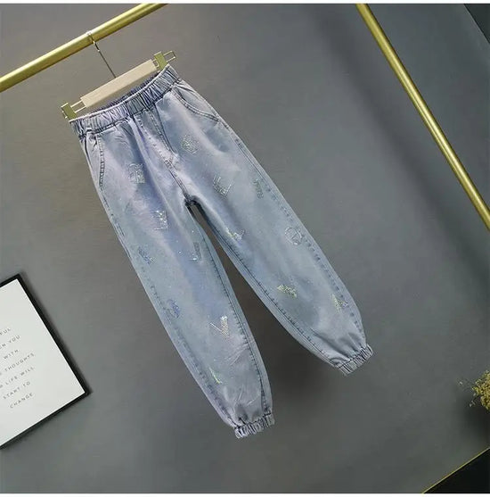 Jeans Donna Vita Alta con Gamba Larga e Vita Elasticizzata –Estate 2025