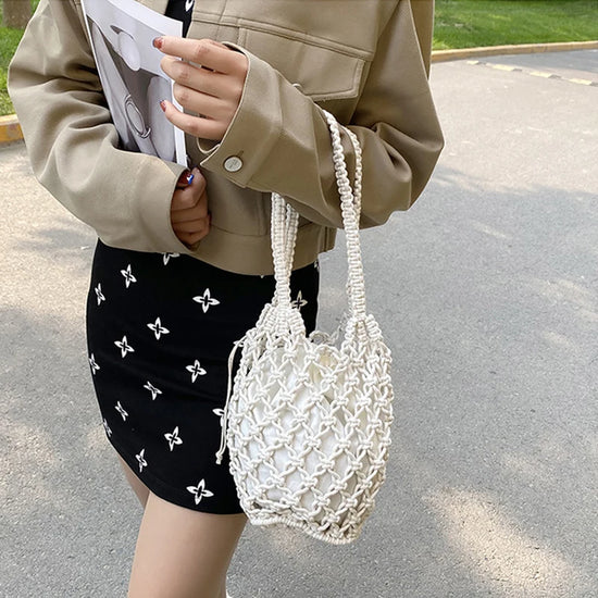 Borsa a secchiello in paglia intrecciata a mano – con coulisse e tracolla, perfetta per spiaggia e shopping