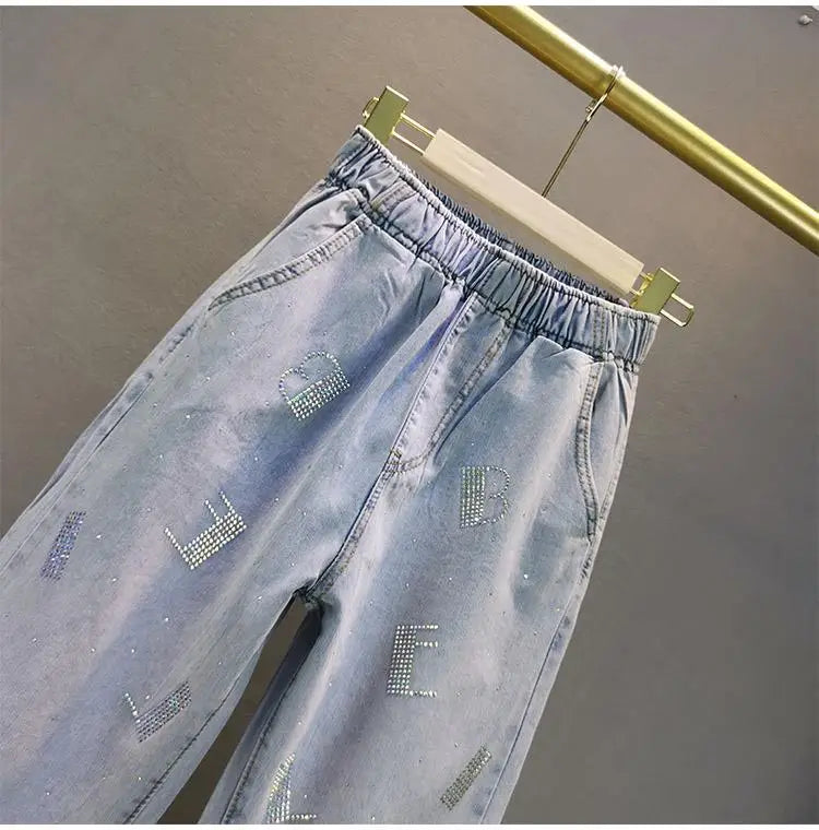 Jeans Donna Vita Alta con Gamba Larga e Vita Elasticizzata –Estate 2025