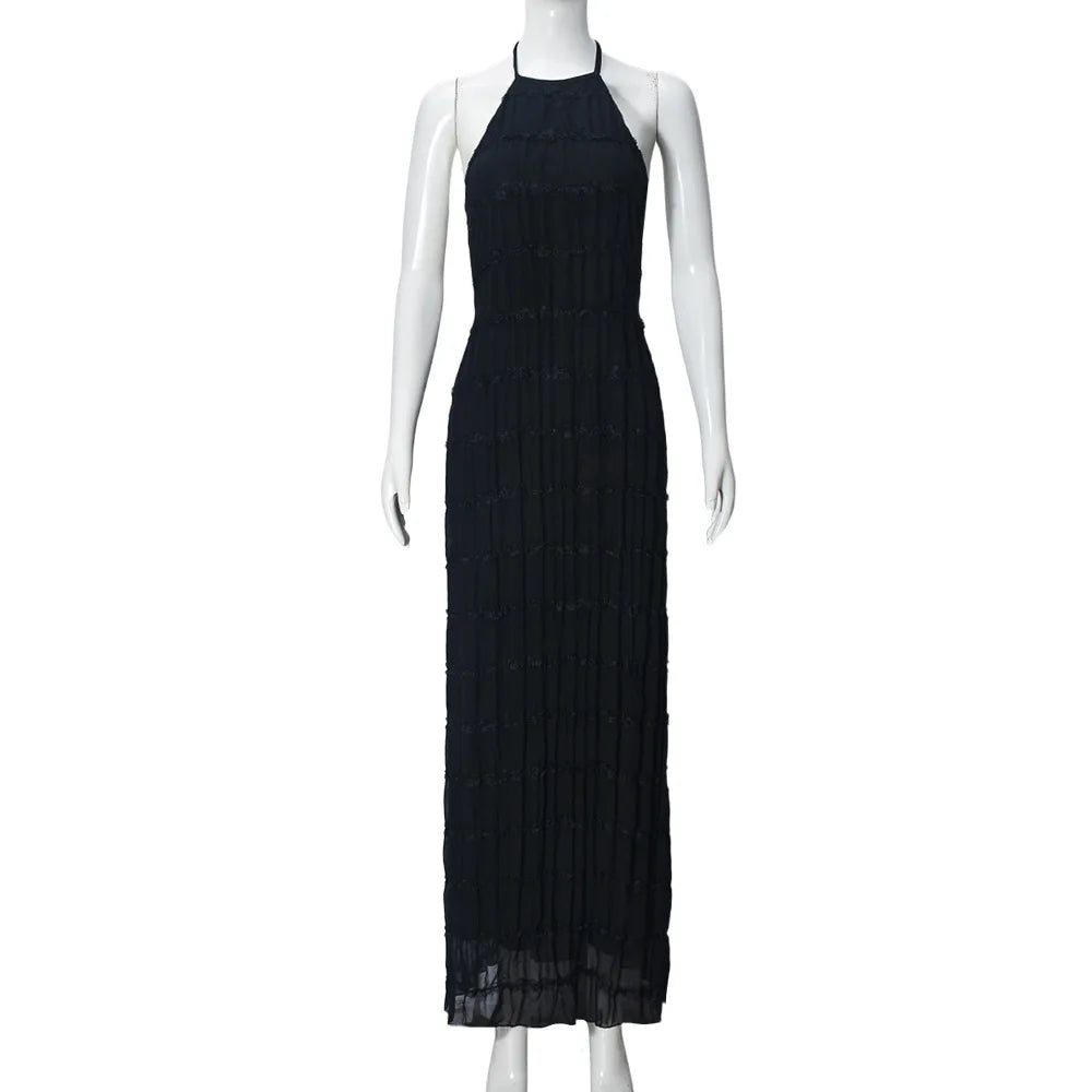 abito lungo donna con schiena scoperta e pieghe elegante