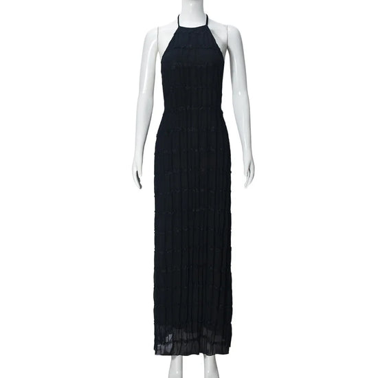 abito lungo donna con schiena scoperta e pieghe elegante