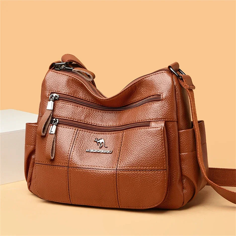 Borsa a tracolla donna con tasche e scomparti - foto 123 della galleria