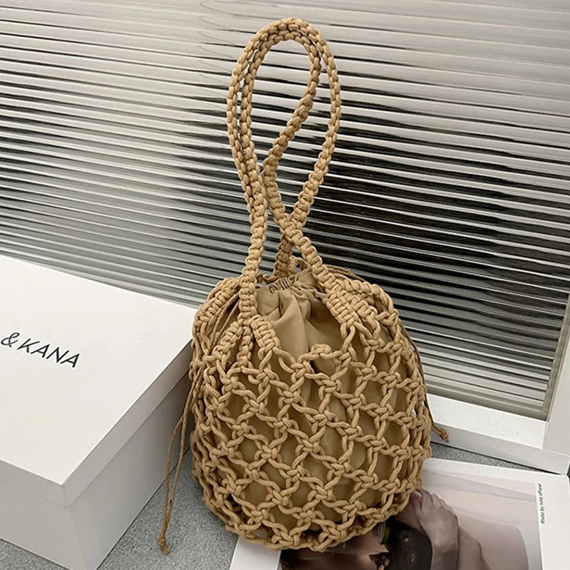 Borsa a secchiello in paglia intrecciata a mano – con coulisse e tracolla, perfetta per spiaggia e shopping