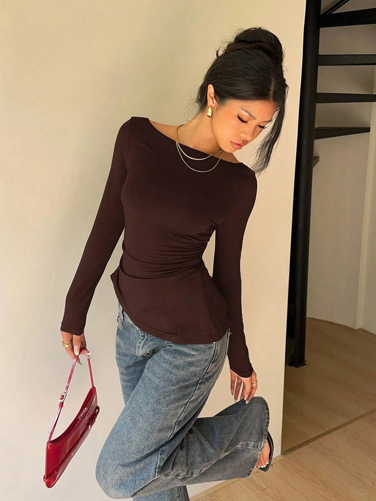 Maglia donna con pizzo e fiocco a maniche lunghe