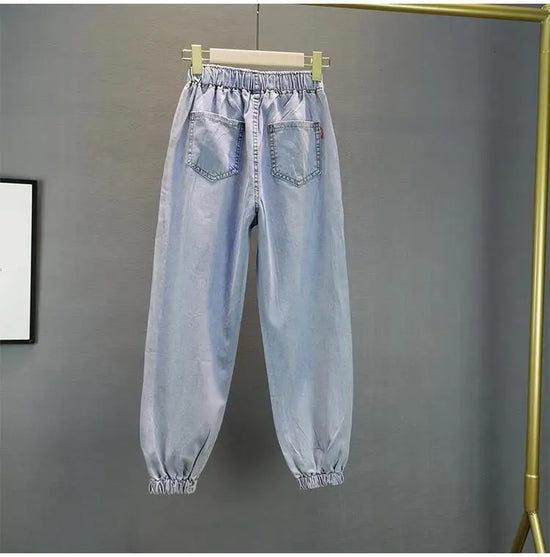Jeans Donna Vita Alta con Gamba Larga e Vita Elasticizzata –Estate 2025