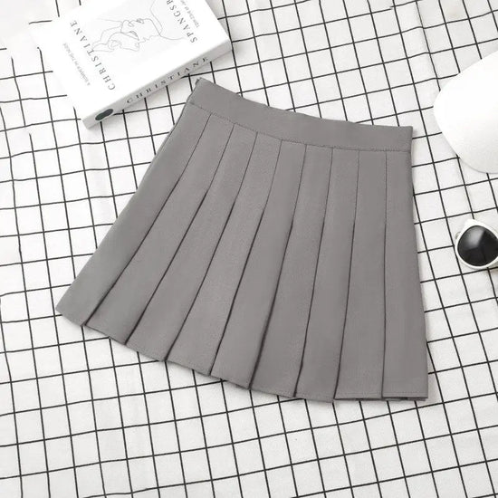 Gonna plissettata cortissima a vita alta – stile uniforme