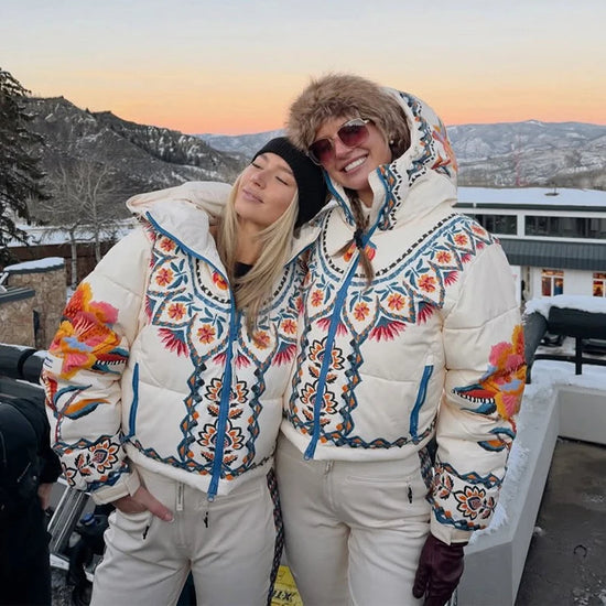 Tuta da neve donna con cappuccio, bianca o fantasia