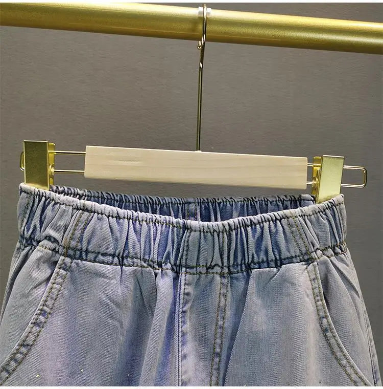 Jeans Donna Vita Alta con Gamba Larga e Vita Elasticizzata –Estate 2025