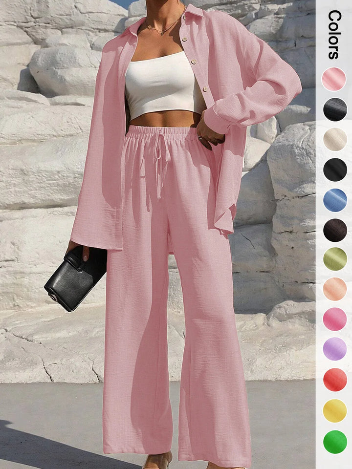 Set donna primavera–estate 2025 – camicia con bottoni e pantaloni wide-leg a vita alta