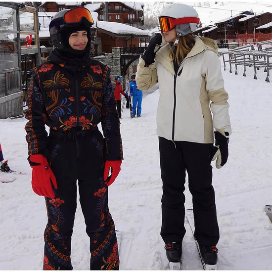 Tuta da neve donna con cappuccio, bianca o fantasia