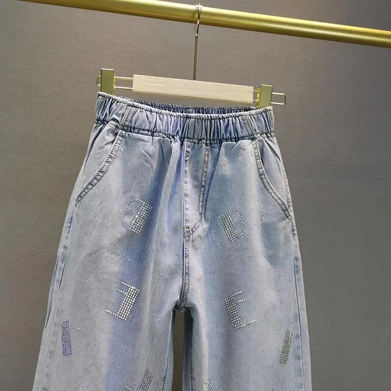 Jeans Donna Vita Alta con Gamba Larga e Vita Elasticizzata –Estate 2025