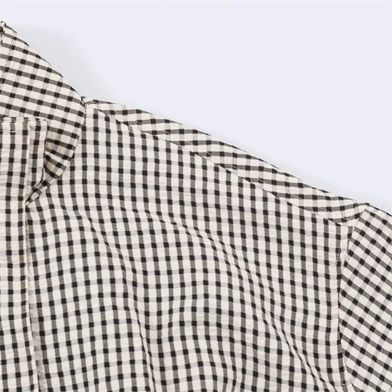 Giacca donna a quadri con collo alto e zip