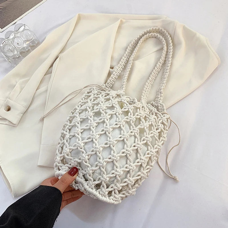Borsa a secchiello in paglia intrecciata a mano – con coulisse e tracolla, perfetta per spiaggia e shopping