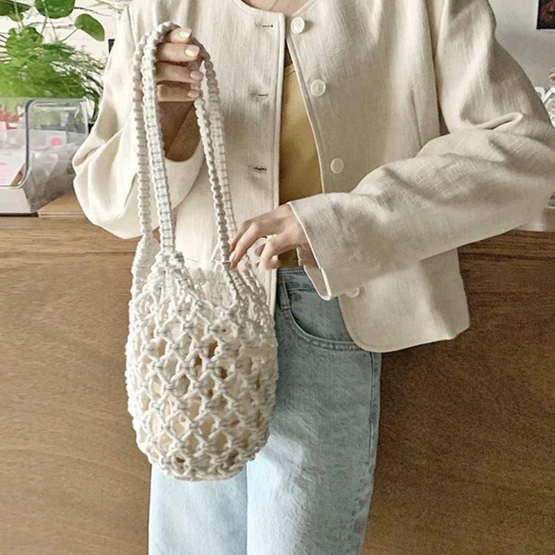 Borsa a secchiello in paglia intrecciata a mano – con coulisse e tracolla, perfetta per spiaggia e shopping