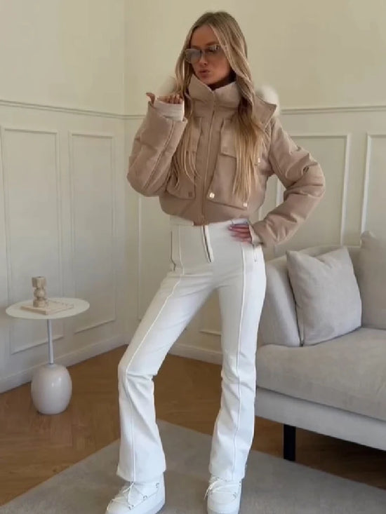 Tuta intera donna imbottita con cappuccio e pantaloni a zampa - foto 9 della galleria