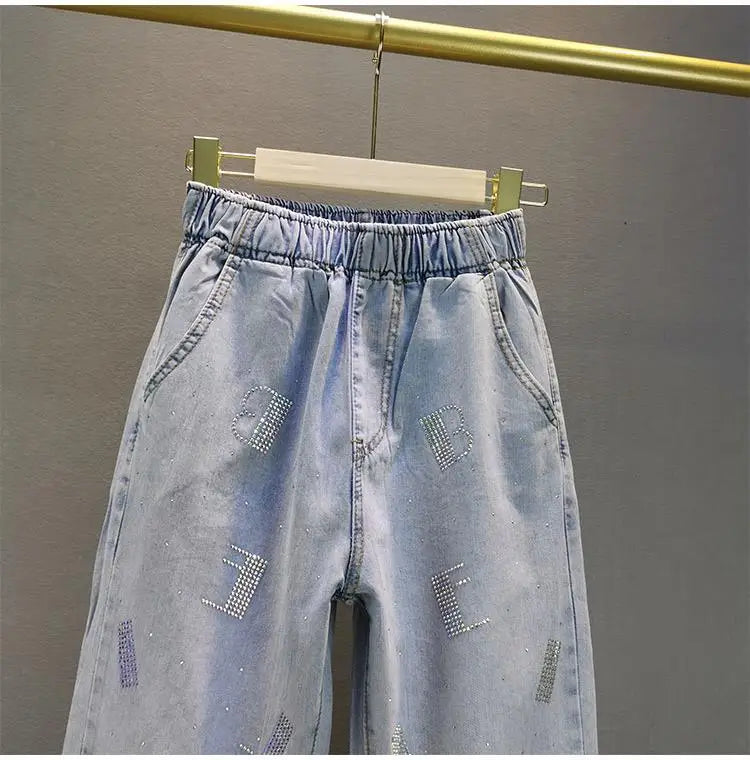 Jeans Donna Vita Alta con Gamba Larga e Vita Elasticizzata –Estate 2025