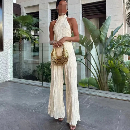 Set donna elegante con top irregolare + pantaloni a zampa bell bottom – completo fashion sexy per outfit da sera / casual chic