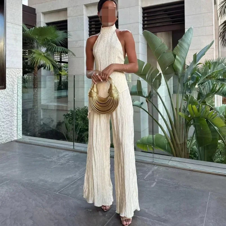 Set donna elegante con top irregolare + pantaloni a zampa bell bottom – completo fashion sexy per outfit da sera / casual chic