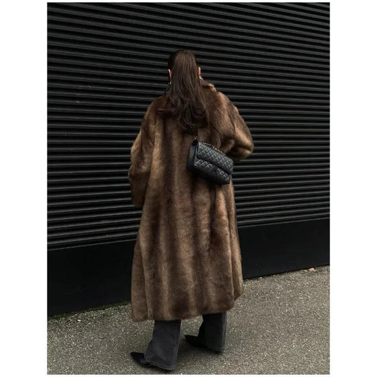 Cappotto donna in pelliccia sintetica dal taglio ampio