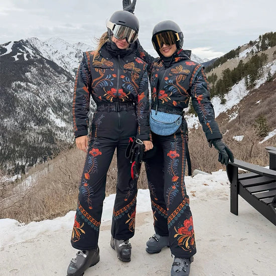 Tuta da neve donna con cappuccio, bianca o fantasia