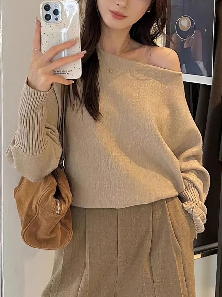 Maglione donna con spalle scoperte e maniche ampie