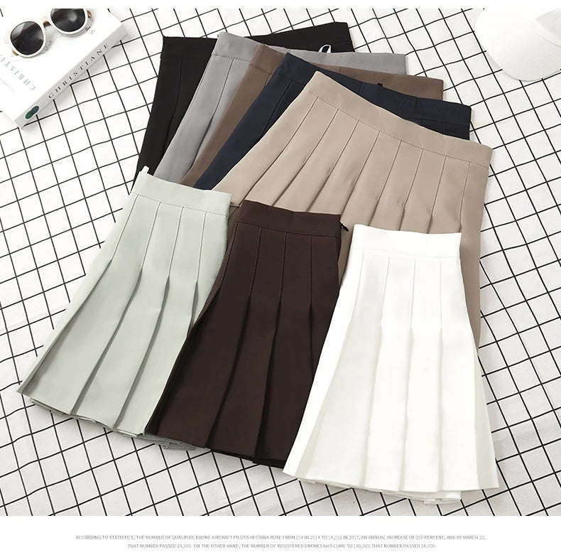 Gonna plissettata cortissima a vita alta – stile uniforme