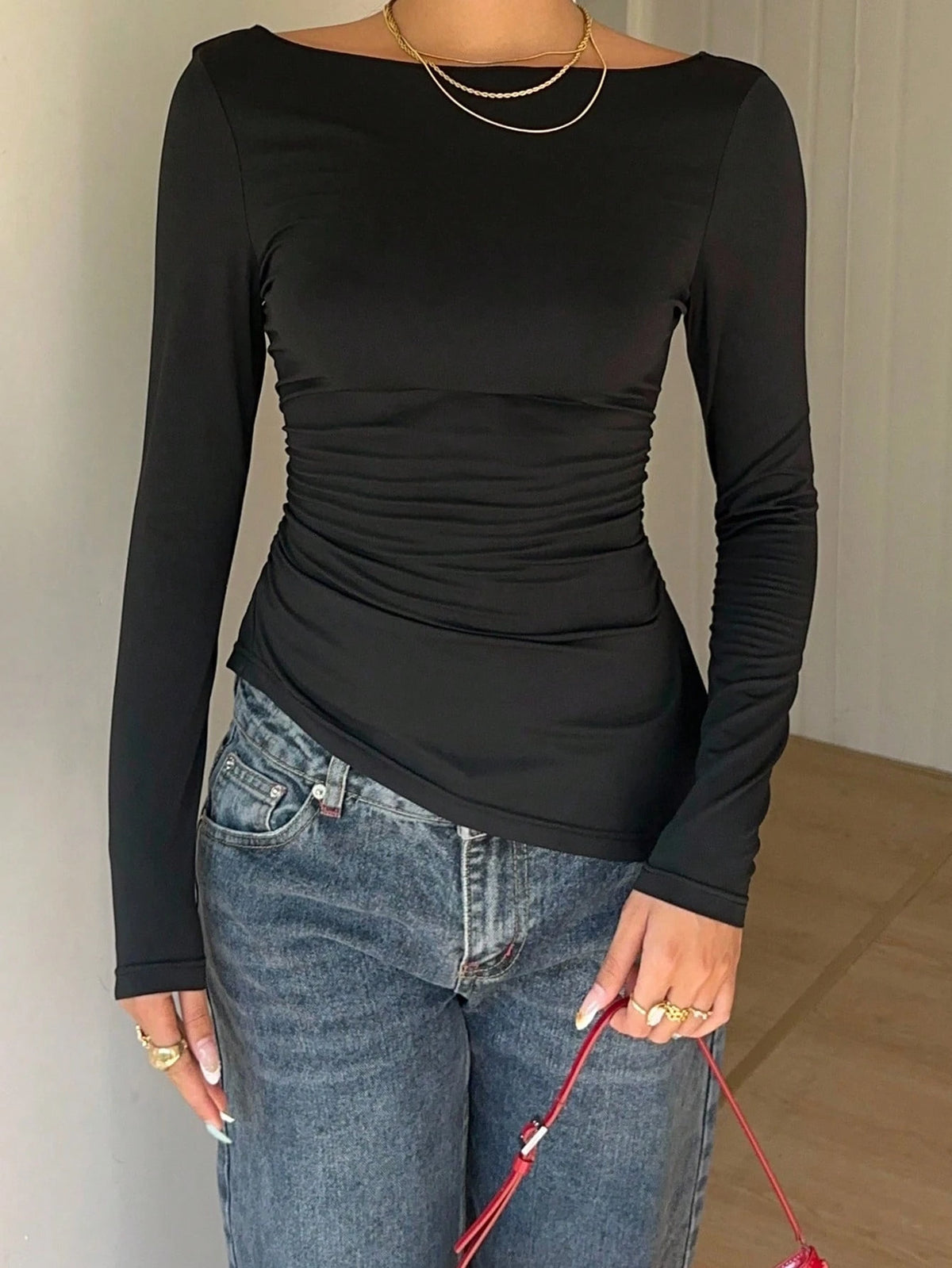 Maglia donna con pizzo e fiocco a maniche lunghe