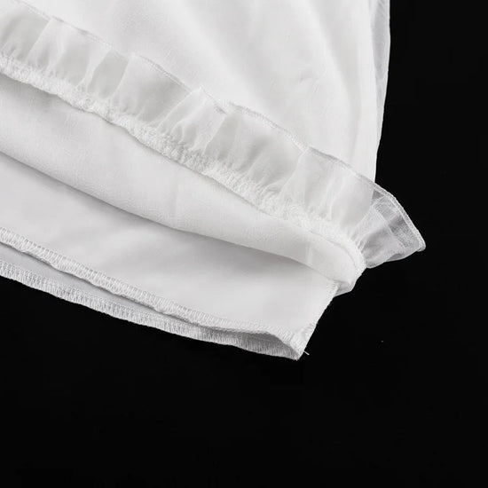 Abito bianco elegante mini con volant e leggero – 2025