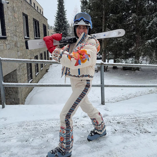 Tuta da neve donna con cappuccio, bianca o fantasia