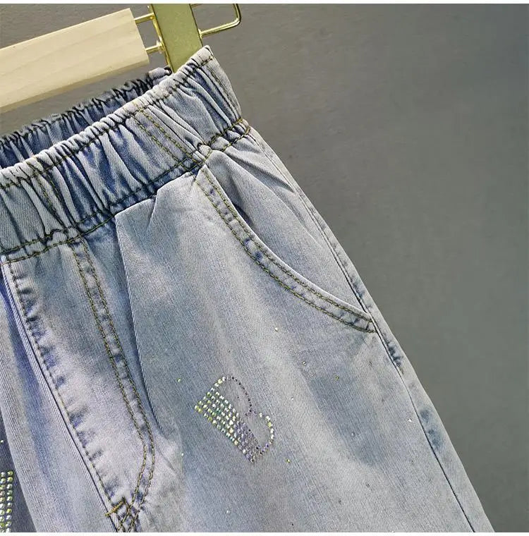 Jeans Donna Vita Alta con Gamba Larga e Vita Elasticizzata –Estate 2025