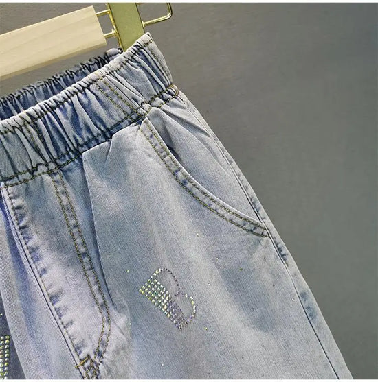 Jeans Donna Vita Alta con Gamba Larga e Vita Elasticizzata –Estate 2025