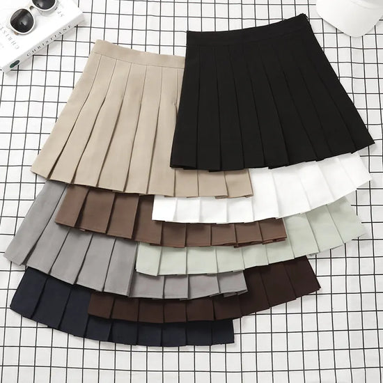 Gonna plissettata cortissima a vita alta – stile uniforme