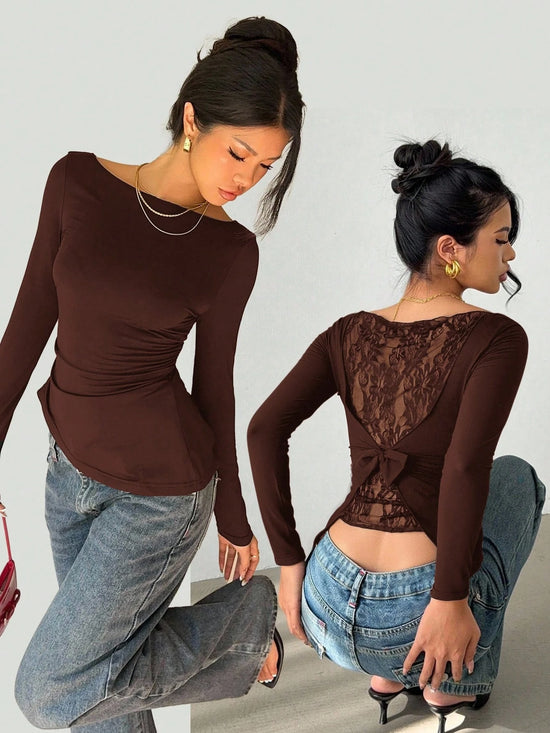 Maglia donna con pizzo e fiocco a maniche lunghe