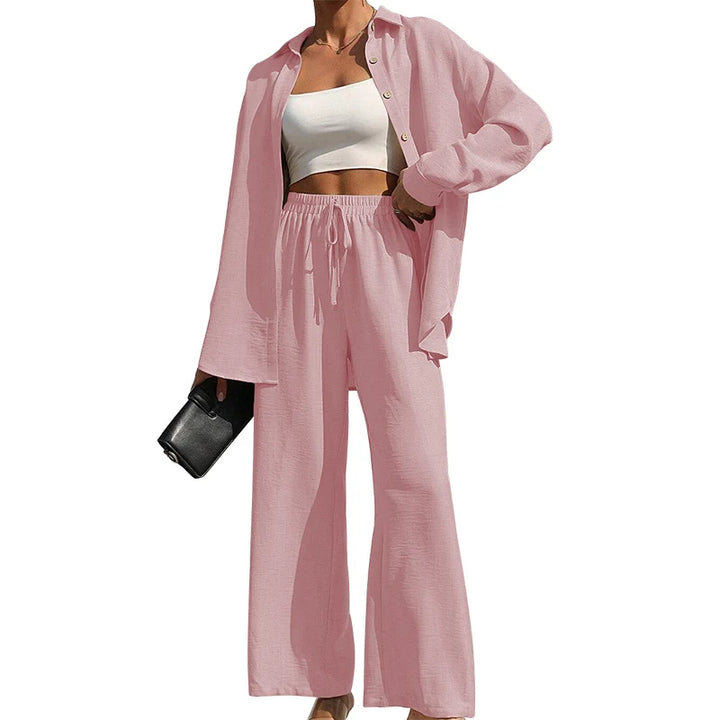 Set donna primavera–estate 2025 – camicia con bottoni e pantaloni wide-leg a vita alta