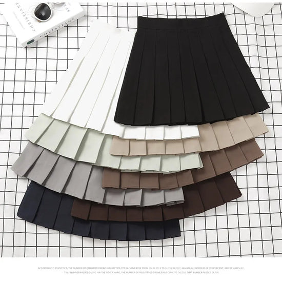 Gonna plissettata cortissima a vita alta – stile uniforme